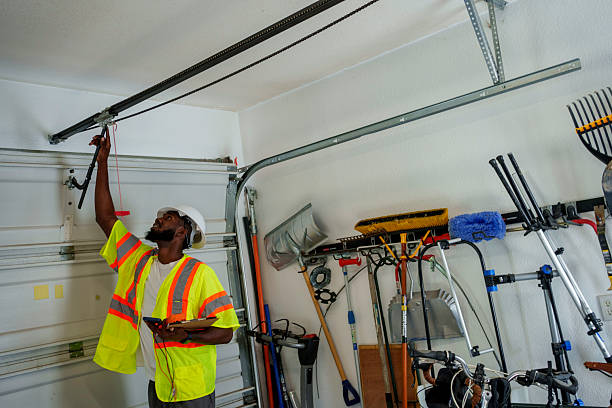 Professional Garage Door Panel Replacement technician working in Harvey, ND