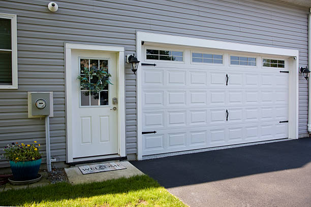 24/7 Emergency Garage Door Panel Replacement experts in Harvey, ND